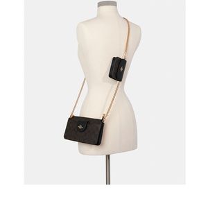 Black Coach crossbody bag.